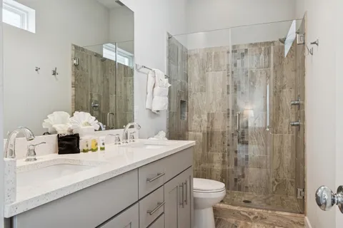 an aerial view of a city with lots of residential buildings