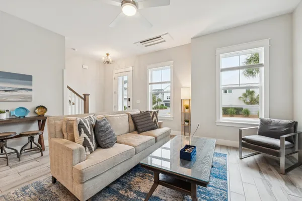 a living room with furniture and a window