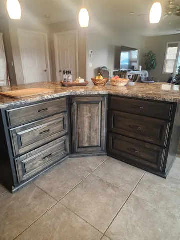 a kitchen with a sink and a cabinets