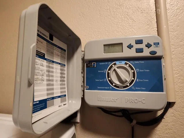 a view of a projector room with a table and chairs