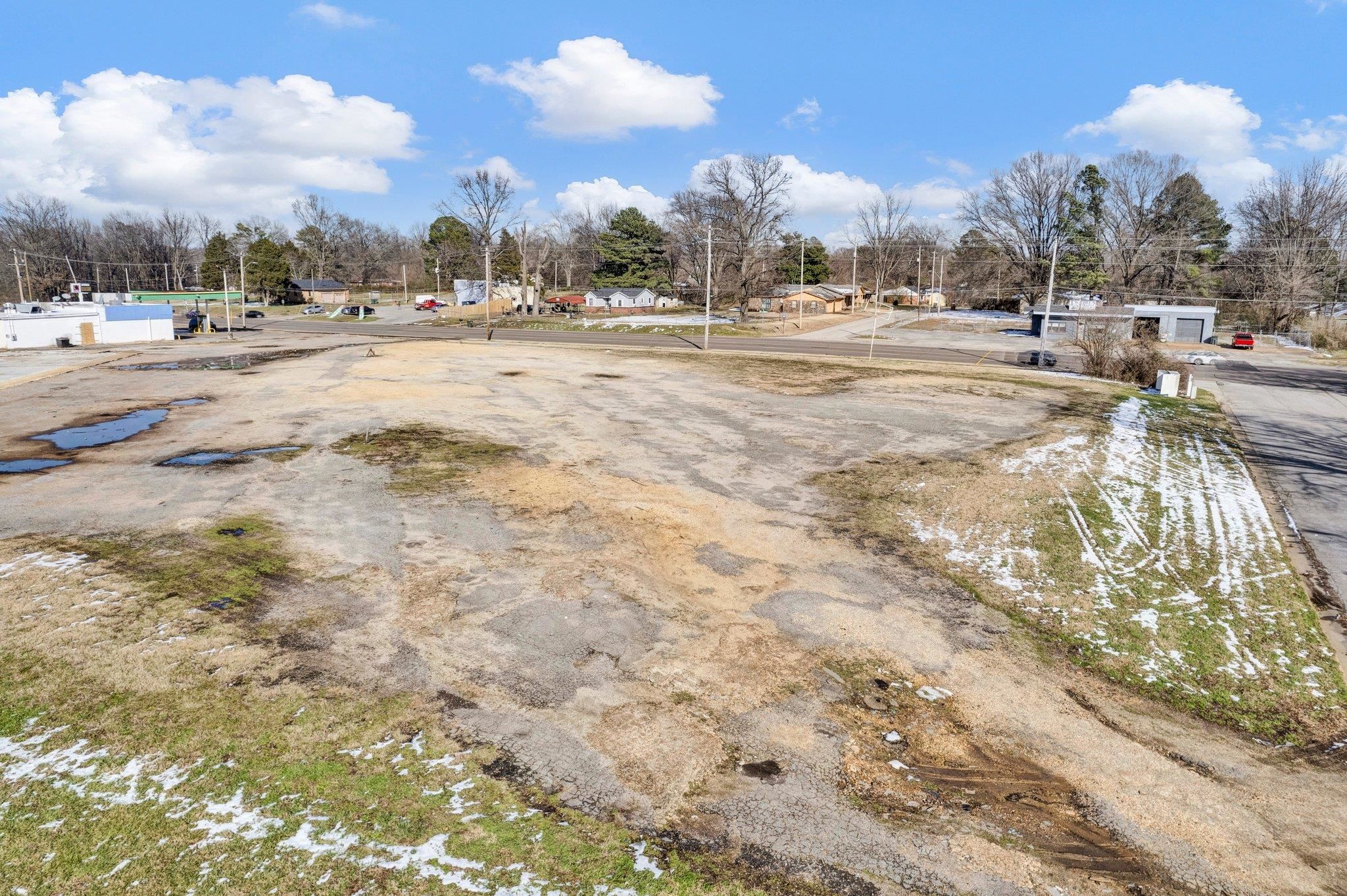 4777 Horn Lake Road Memphis, TN 38109 - Photo 13 of 14 a view of a dry yard with trees and houses