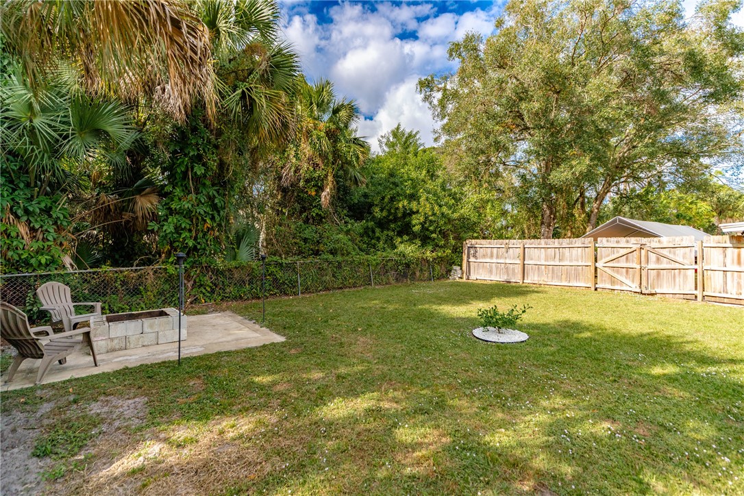 3655 2nd Place Vero Beach, FL 32968 - Photo 19 of 27 a view of a playground with a slide