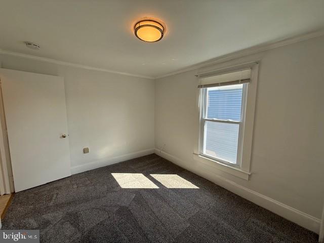 15 Brewer Avenue, Unit B Annapolis, MD 21401 - Photo 17 of 26 an empty room with windows