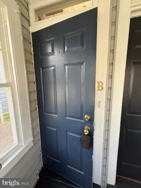 15 Brewer Avenue, Unit B Annapolis, MD 21401 - Photo 5 of 26 a bathroom with a shower and mirror