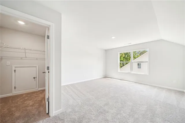 an empty room with a natural light