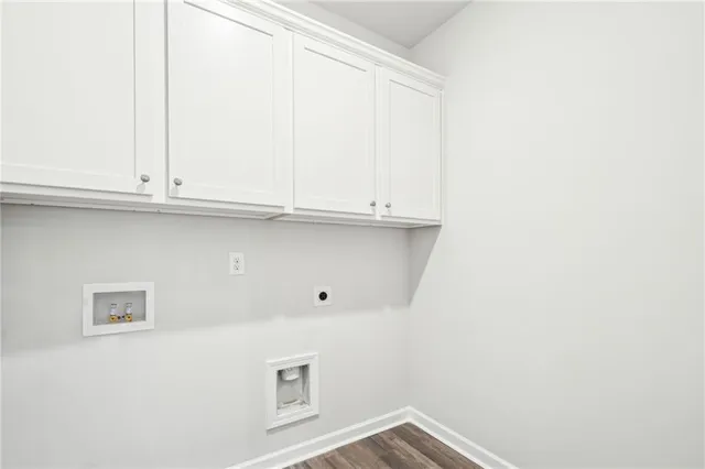 a bathroom with a granite countertop sink a toilet and bathtub