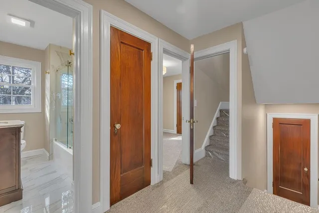 a view of a livingroom with furniture and windows
