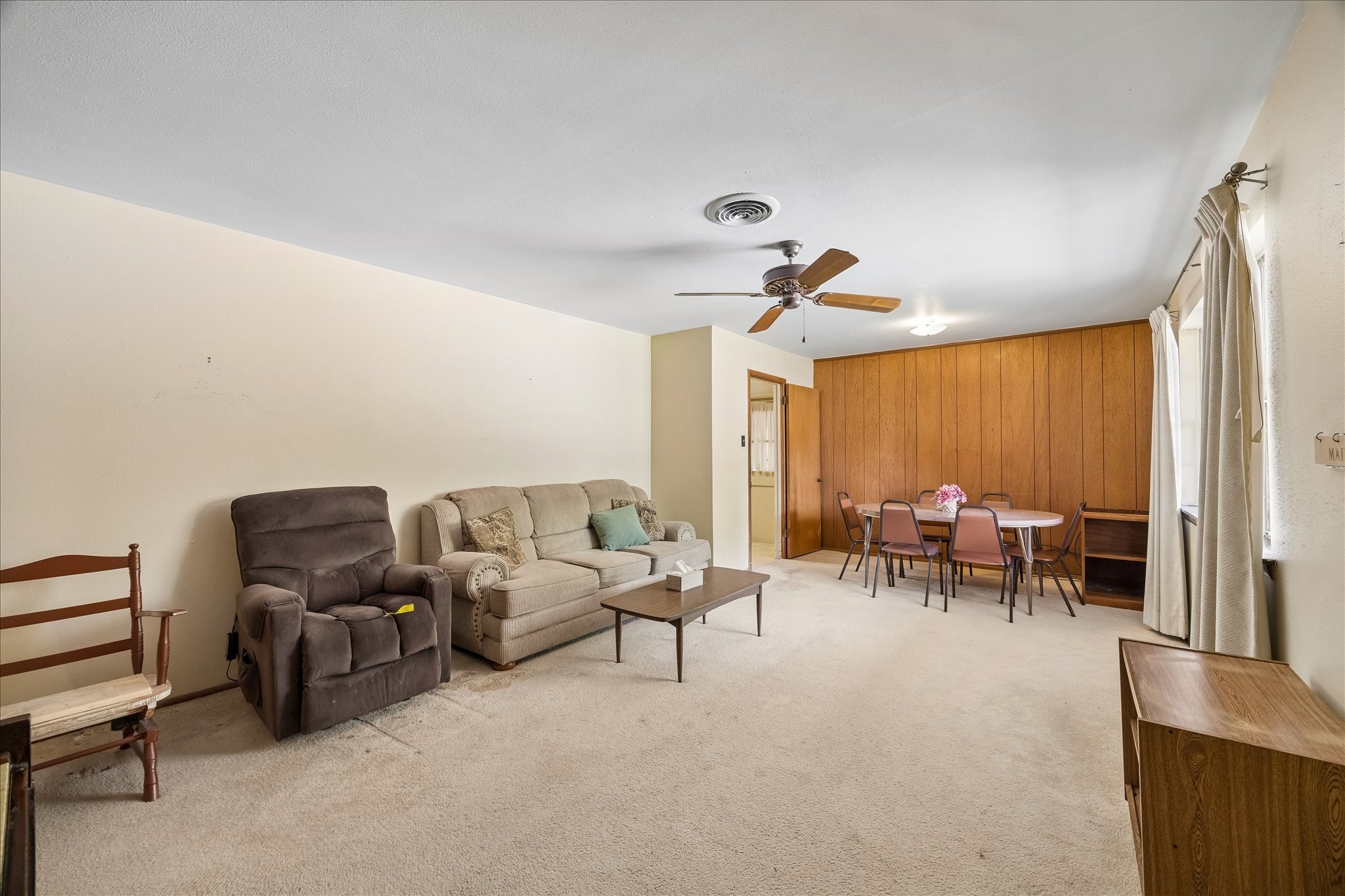 6131 Birdwood Road Houston, TX 77074 - Photo 3 of 14 a living room with furniture and a large window