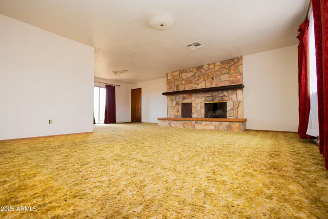 a view of an empty room with window