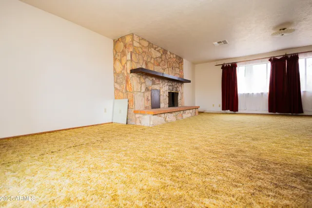 a view of an empty room with window