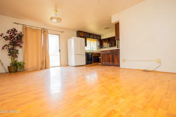 a view of kitchen and natural light