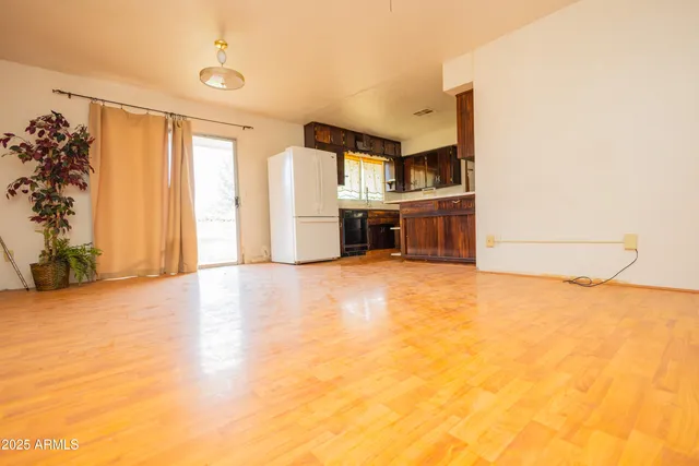 a view of kitchen and natural light