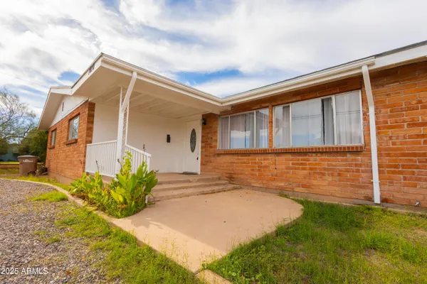 a house view with a outdoor space