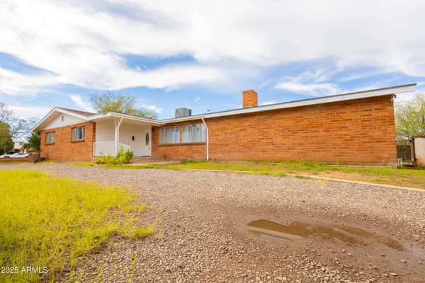 a front view of house with ocean view