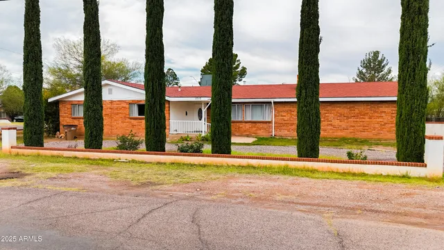 a view of a building with a street from a window
