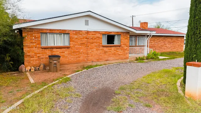 a front view of a house with patio