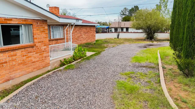a view of swimming pool with a yard