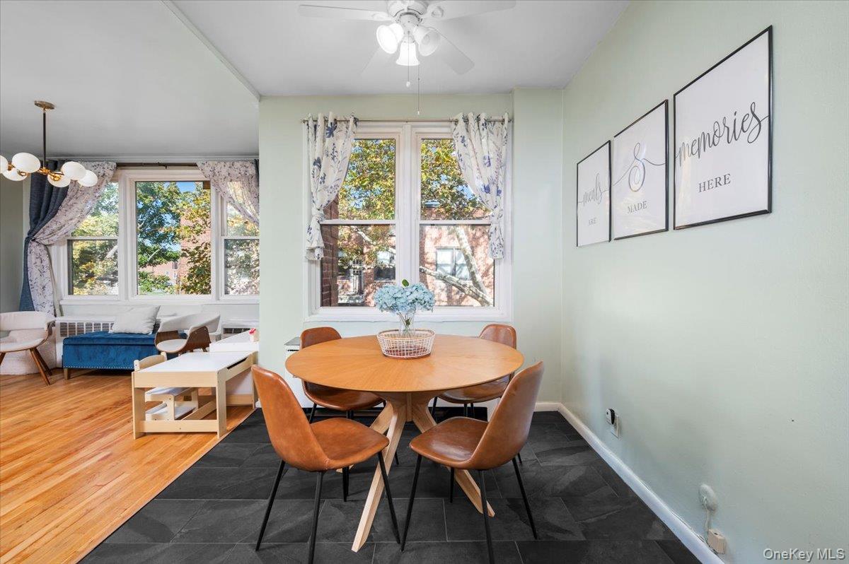 953 West Boston Post Road, Unit 3G Mamaroneck, NY 10543 - Photo 10 of 23 a dining room with furniture and window
