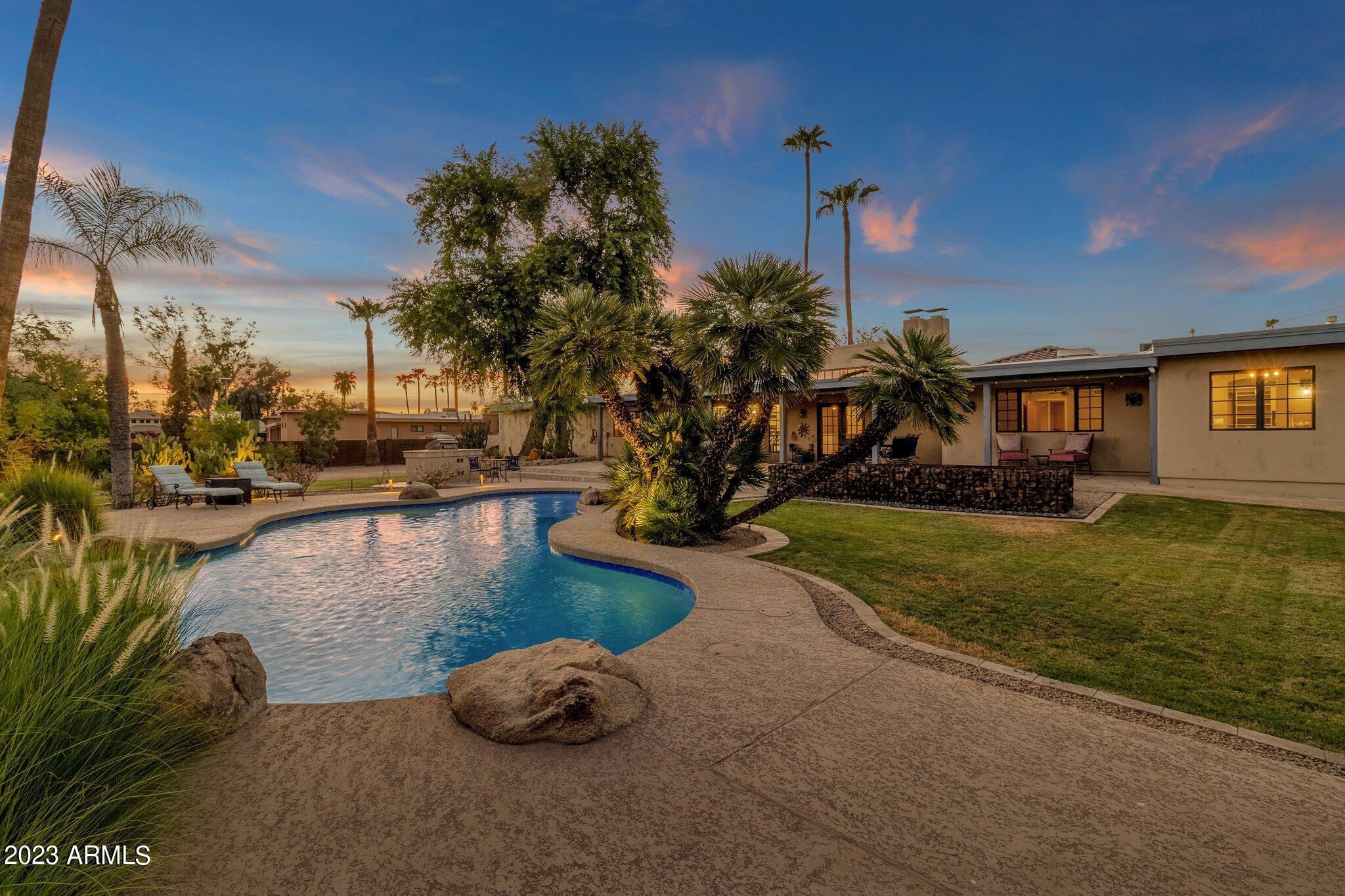 8115 East Redfield Road Scottsdale, AZ 85260 - Photo 34 of 43 Backyard Pool and Grass