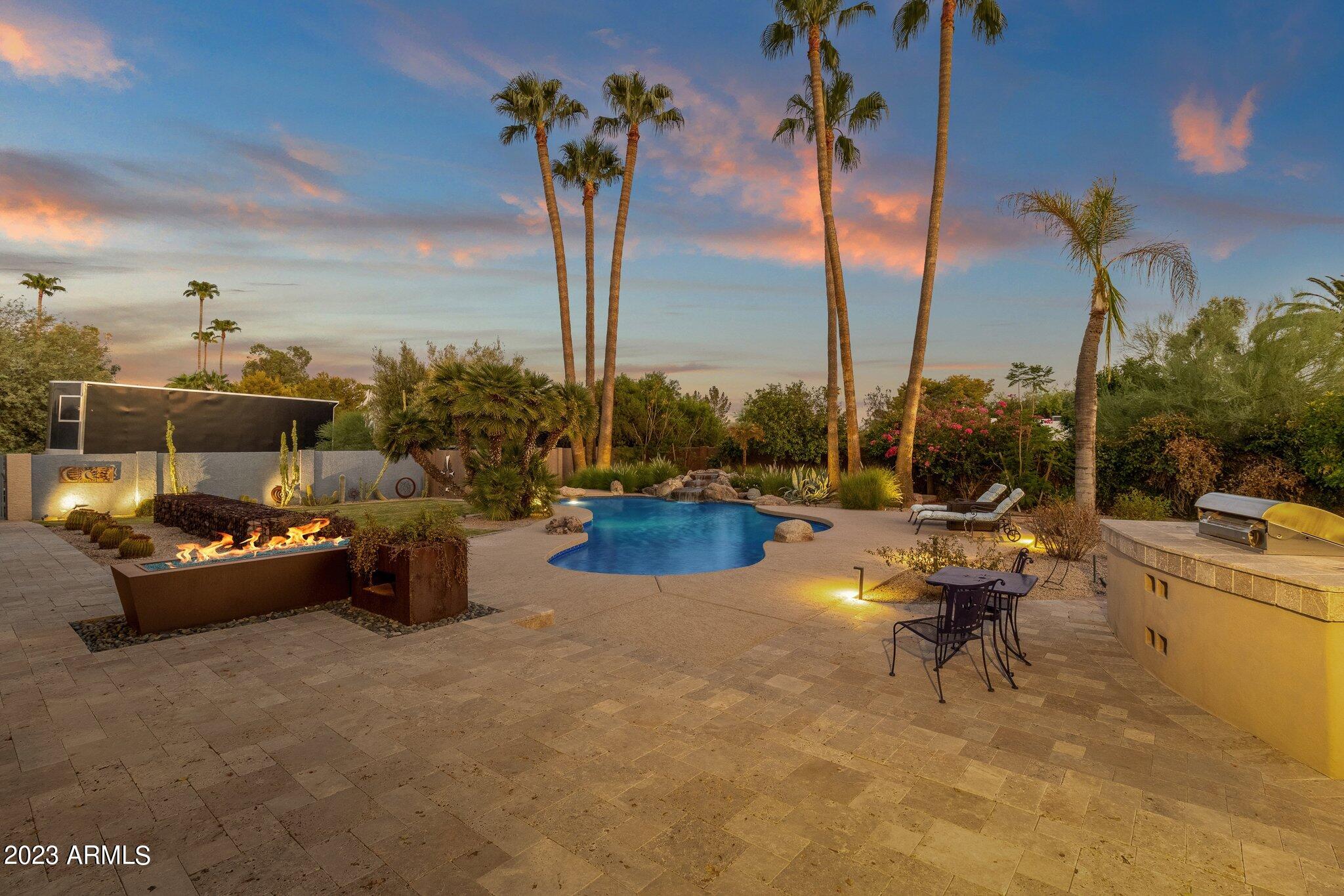 8115 East Redfield Road Scottsdale, AZ 85260 - Photo 36 of 43 Backyard Pool and Firepit
