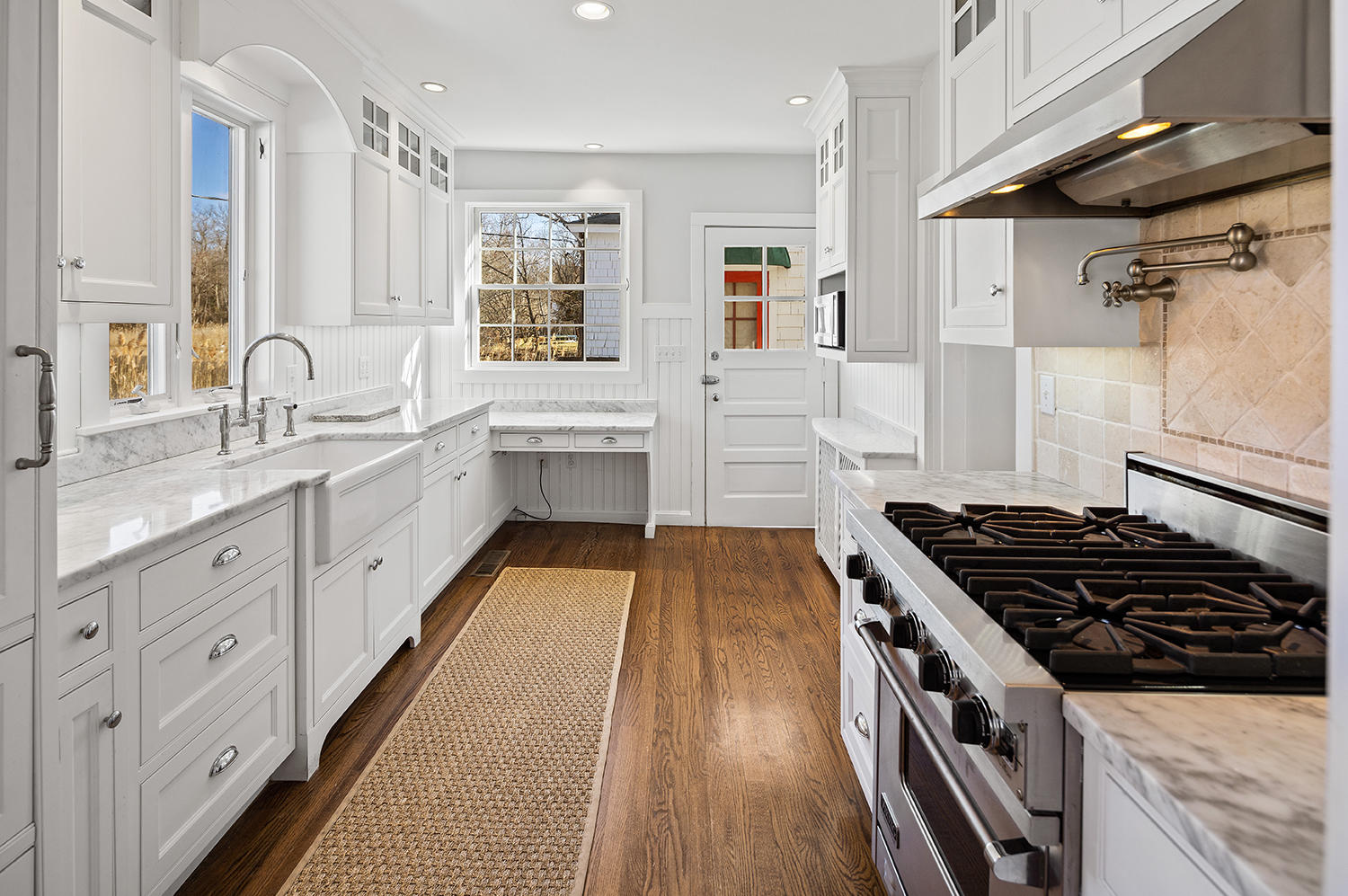 33 Old Farm Road Darien, CT 06820 - Photo 11 of 28 a kitchen with granite countertop a stove and a sink