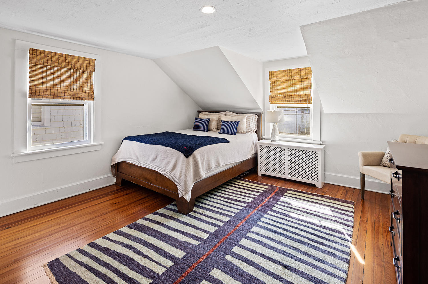 33 Old Farm Road Darien, CT 06820 - Photo 18 of 28 a bedroom with a bed and wooden floor
