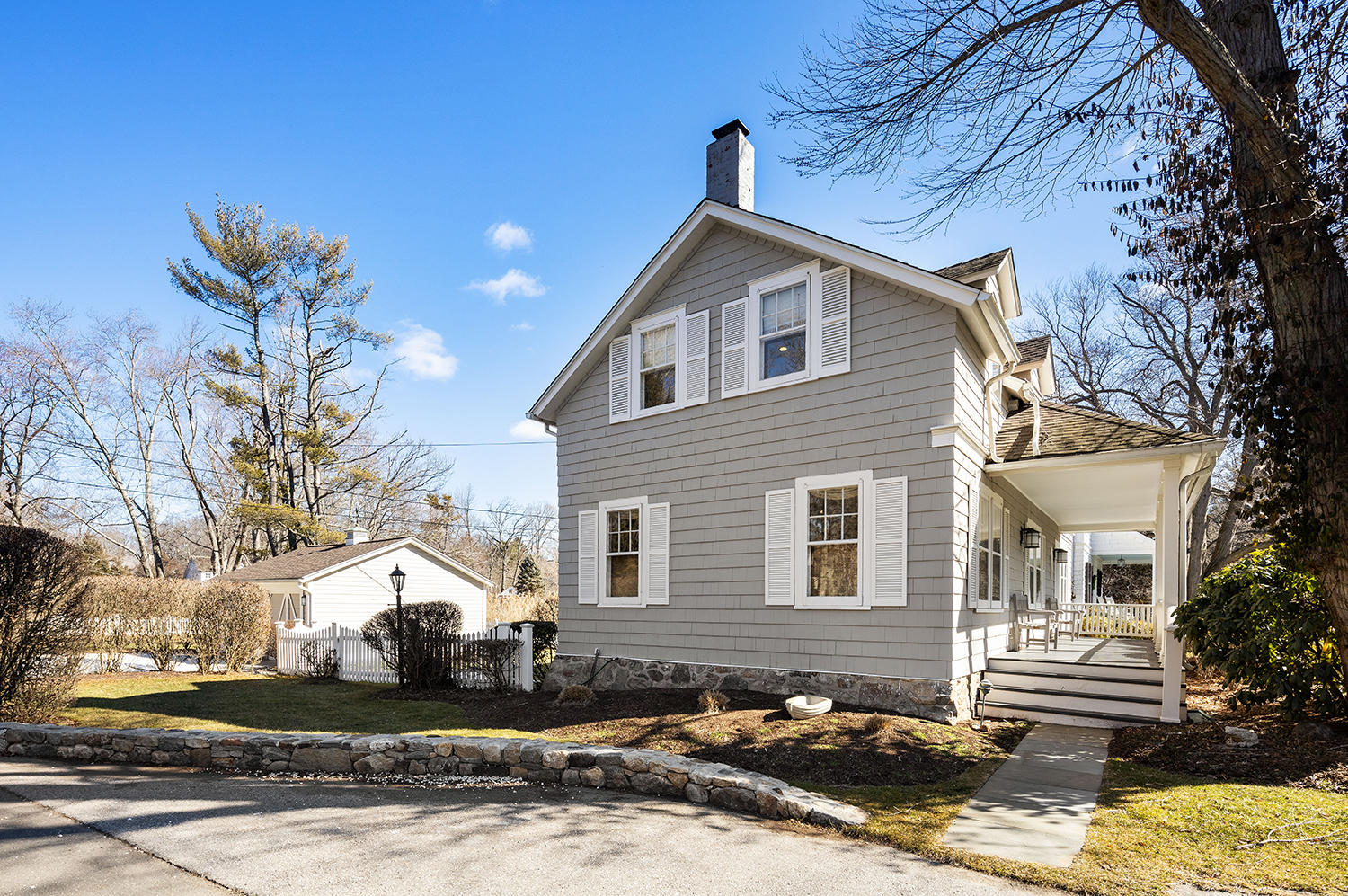 33 Old Farm Road Darien, CT 06820 - Photo 3 of 28 a front view of a house with a yard