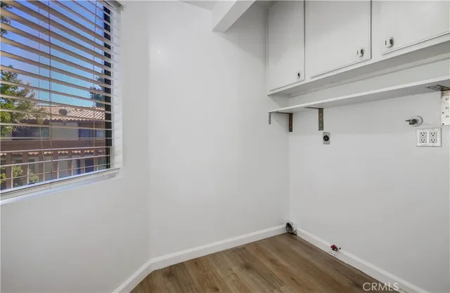 a view of a room with rack on the wall