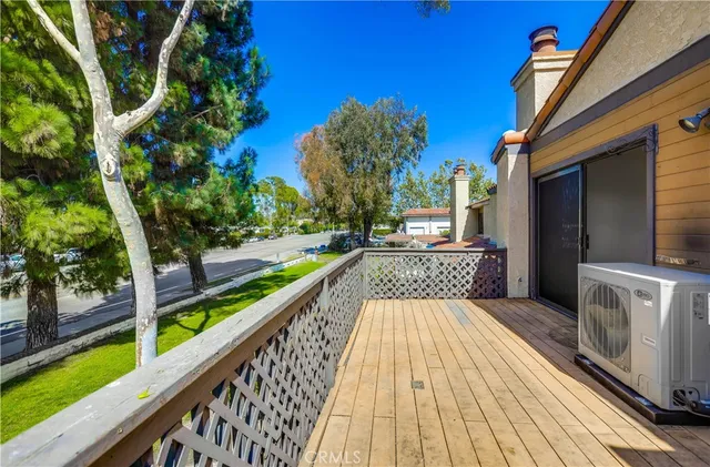 a view of balcony with a potted plant
