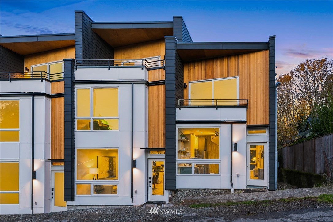 5200 Renton Avenue South Seattle, WA 98118 - Photo 1 of 21 a view of a brick house with large windows