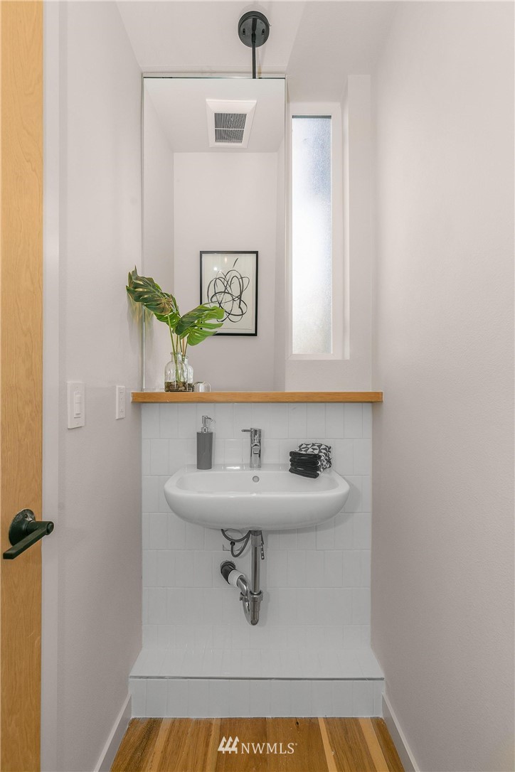 5200 Renton Avenue South Seattle, WA 98118 - Photo 18 of 21 a bathroom with a sink and mirror