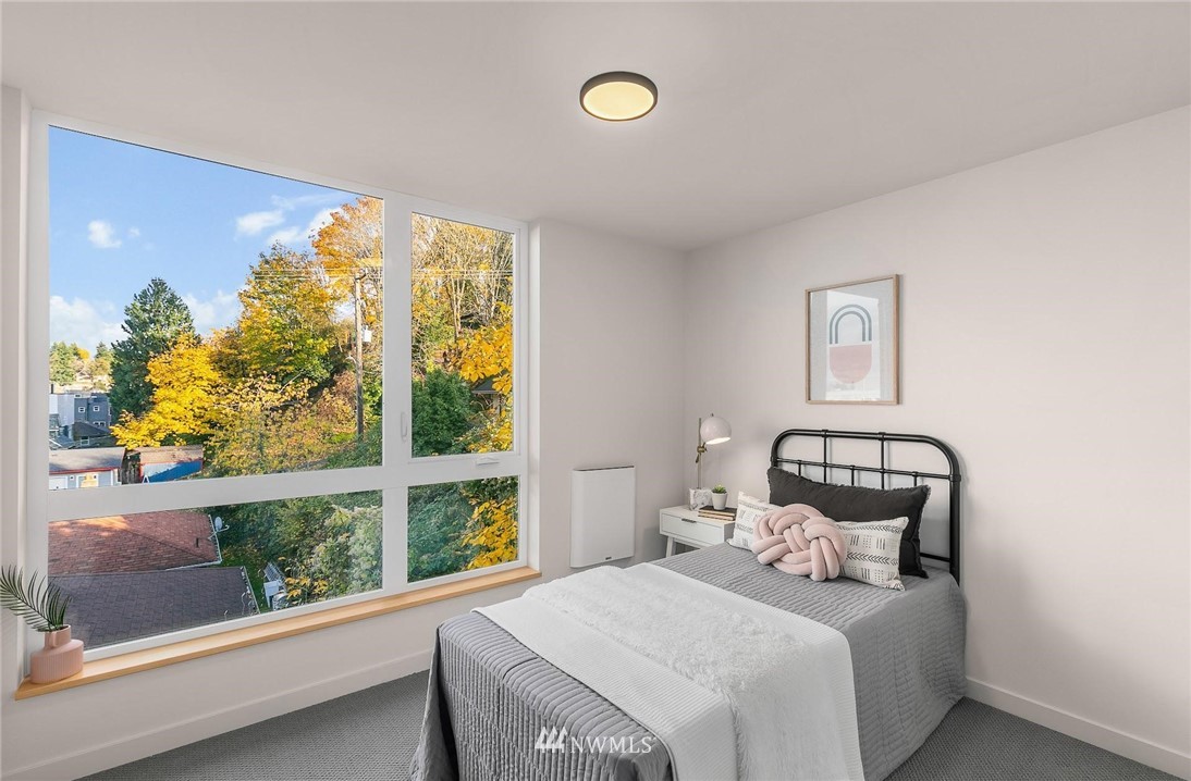 5200 Renton Avenue South Seattle, WA 98118 - Photo 19 of 21 a bedroom with a bed and a window