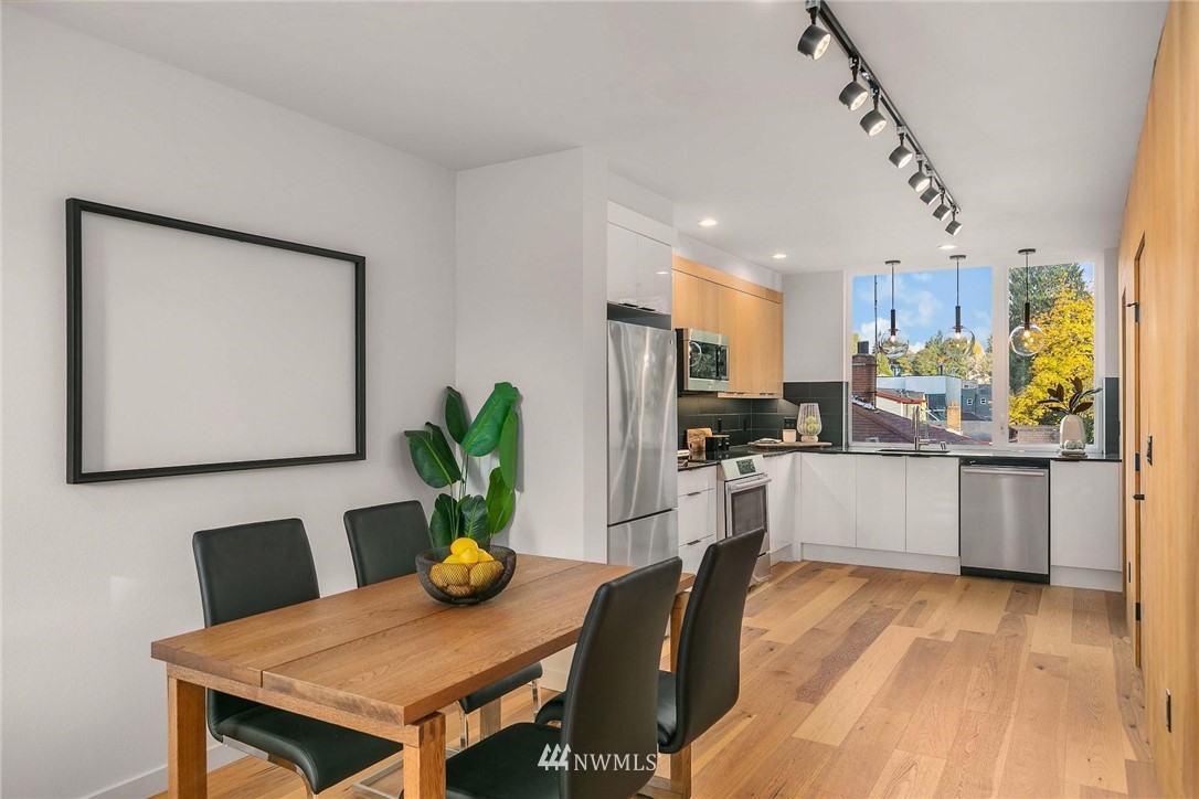 5200 Renton Avenue South Seattle, WA 98118 - Photo 8 of 21 a kitchen with a table and chairs in it