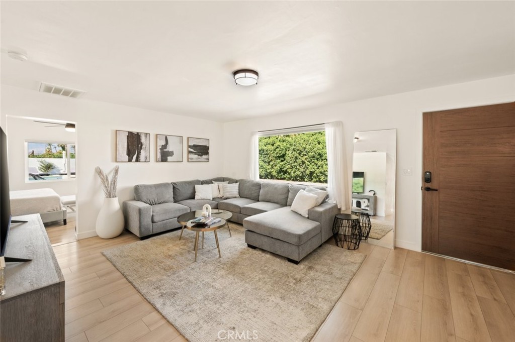 80890 Highway 111 Indio, CA 92201 - Photo 23 of 39 a living room with furniture and a large window