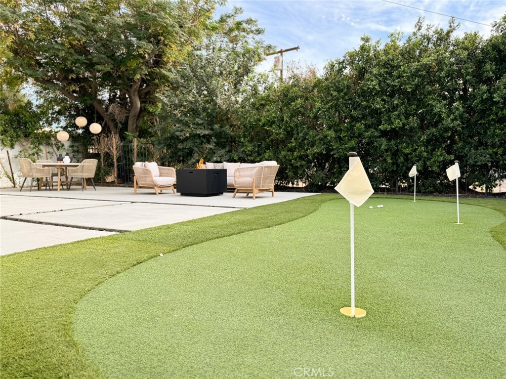 80890 Highway 111 Indio, CA 92201 - Photo 34 of 39 a house view with a play ground in front of it