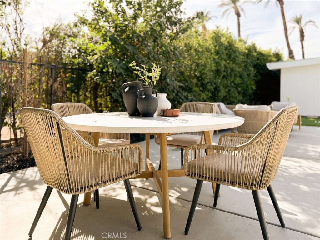 80890 Highway 111 Indio, CA 92201 - Photo 35 of 39 a view of a patio with a table and chairs