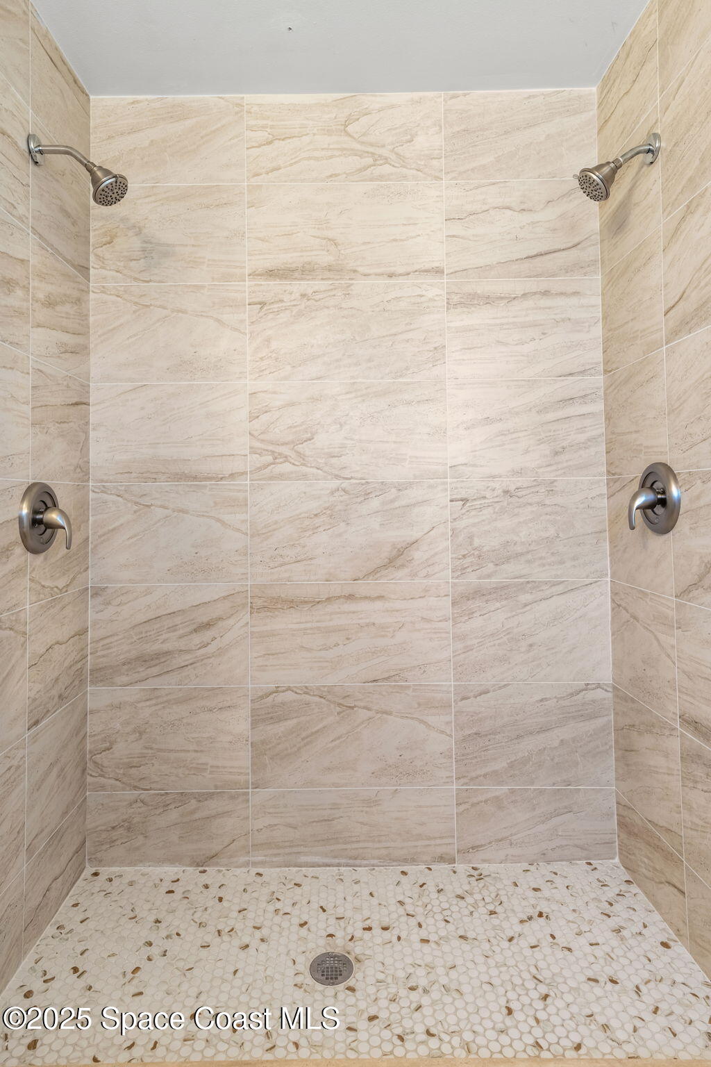 2361 Colony Drive Melbourne, FL 32935 - Photo 18 of 40 a bathroom with a shower