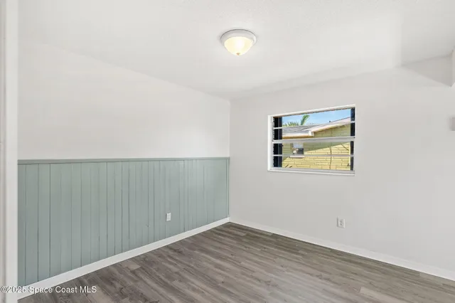 a kitchen with stainless steel appliances a refrigerator sink and cabinets