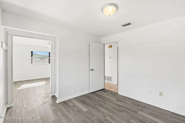 a kitchen with a sink and a window