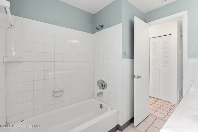 a view of a kitchen with a sink