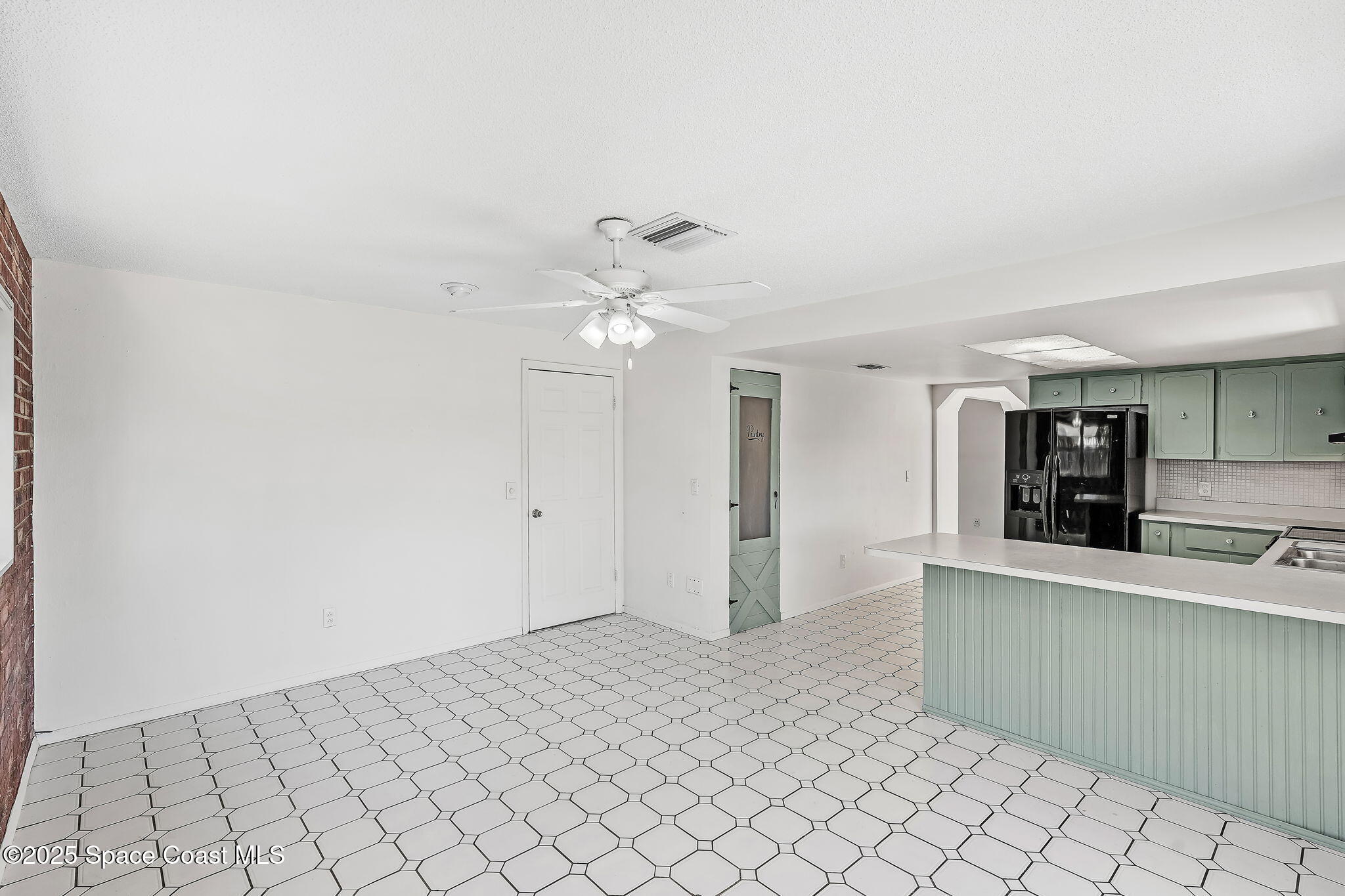2361 Colony Drive Melbourne, FL 32935 - Photo 29 of 40 a view of a kitchen with a sink