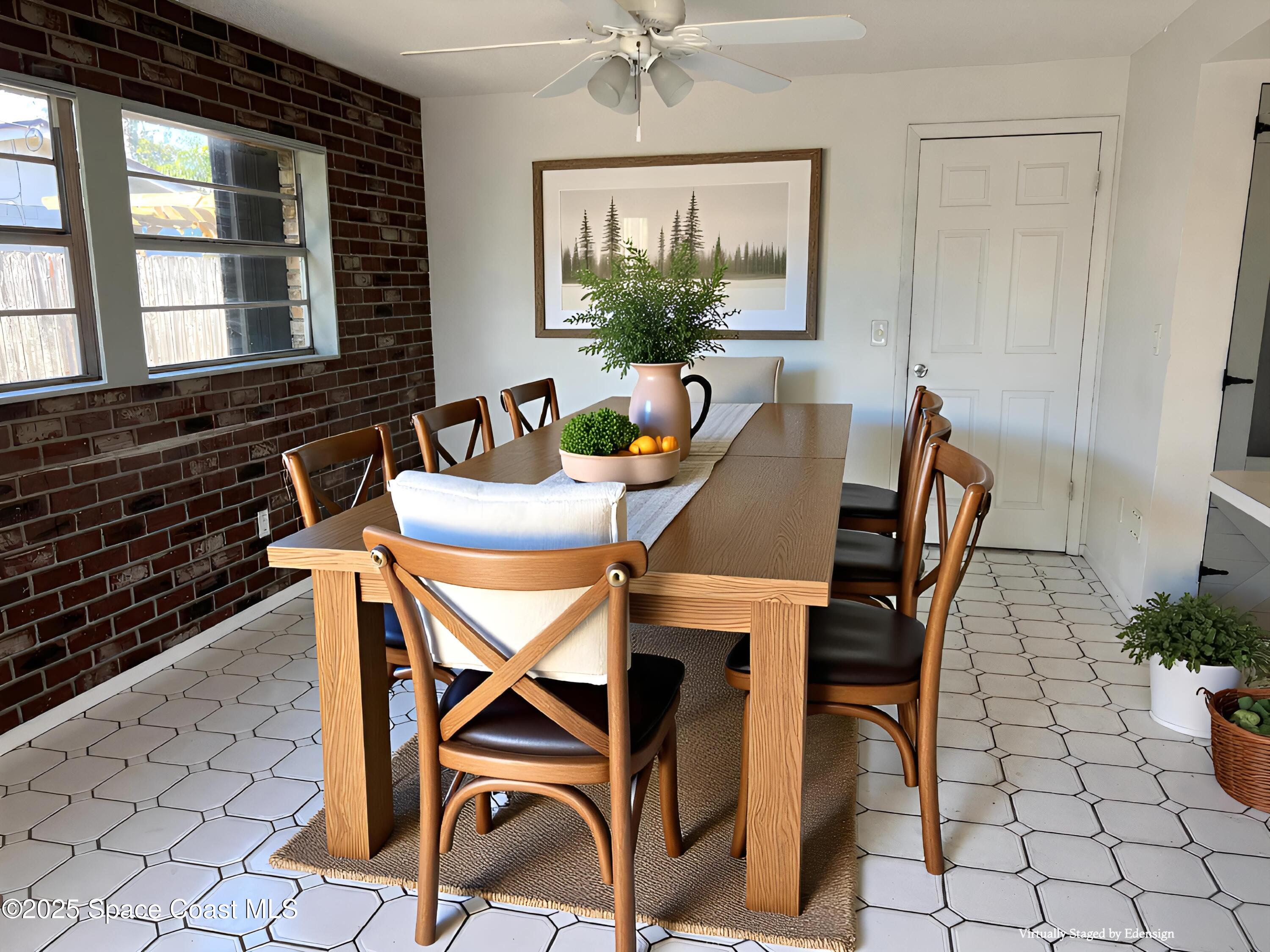 2361 Colony Drive Melbourne, FL 32935 - Photo 31 of 40 a view of a dining room with furniture and window