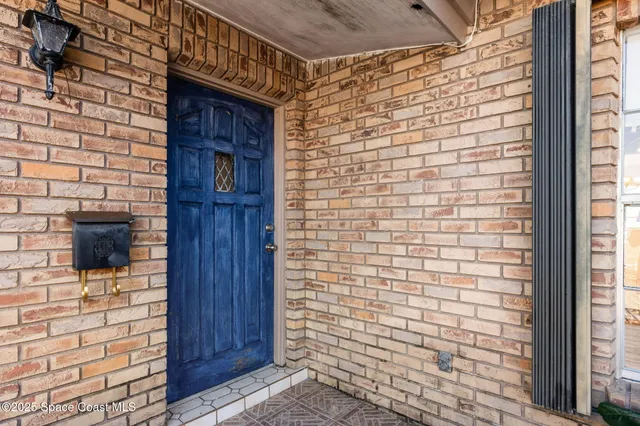 a brick house with a street