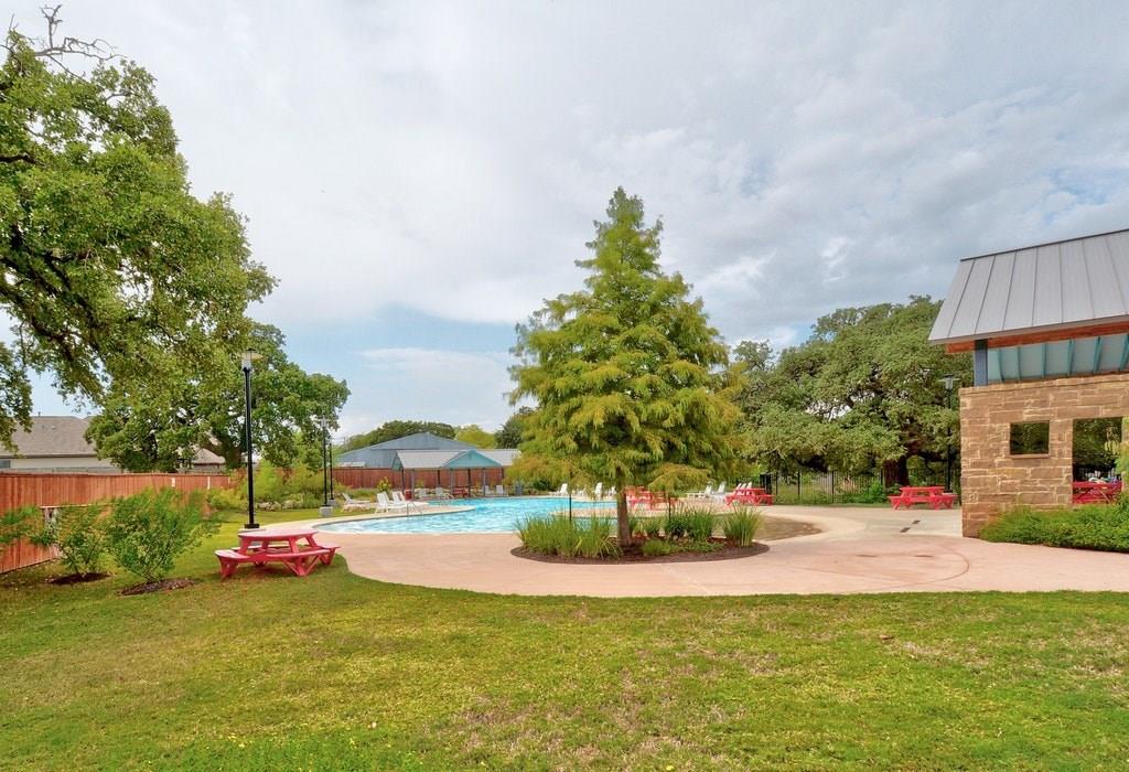 13216 Mariscan Street Manchaca, TX 78652 - Photo 23 of 28 View of yard with an outdoor pool and a patio area