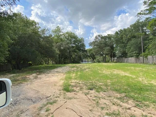a view of a lake with a garden