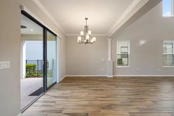 a view of livingroom with hardwood floor and a ceiling fan