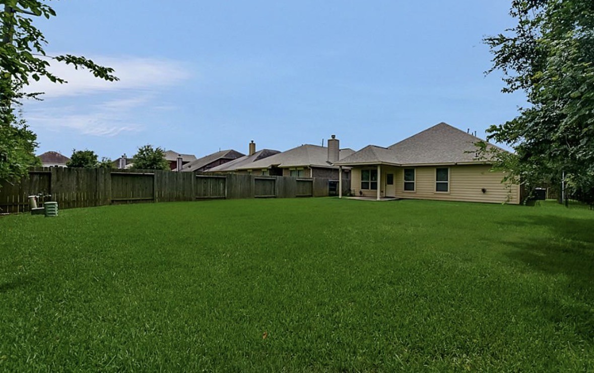 16710 Dover Mills Drive Spring, TX 77379 - Photo 13 of 15 a front view of a house with garden