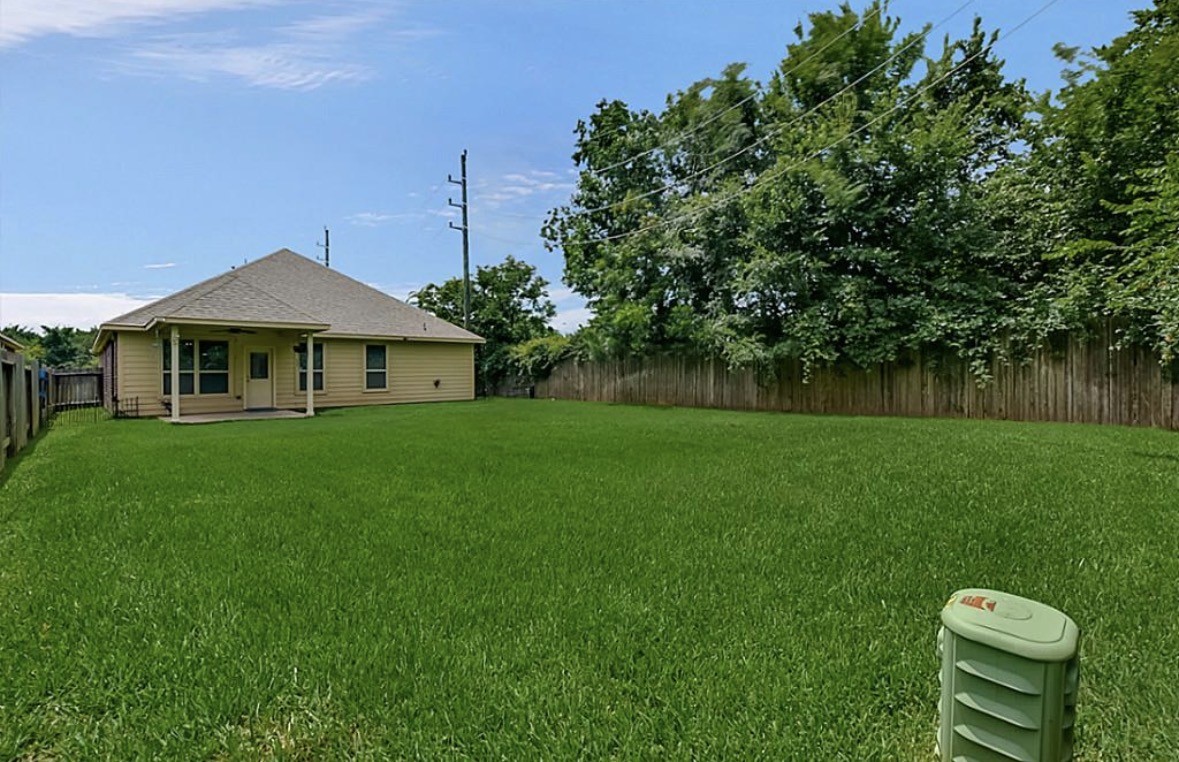 16710 Dover Mills Drive Spring, TX 77379 - Photo 15 of 15 a view of an house with backyard space and garden