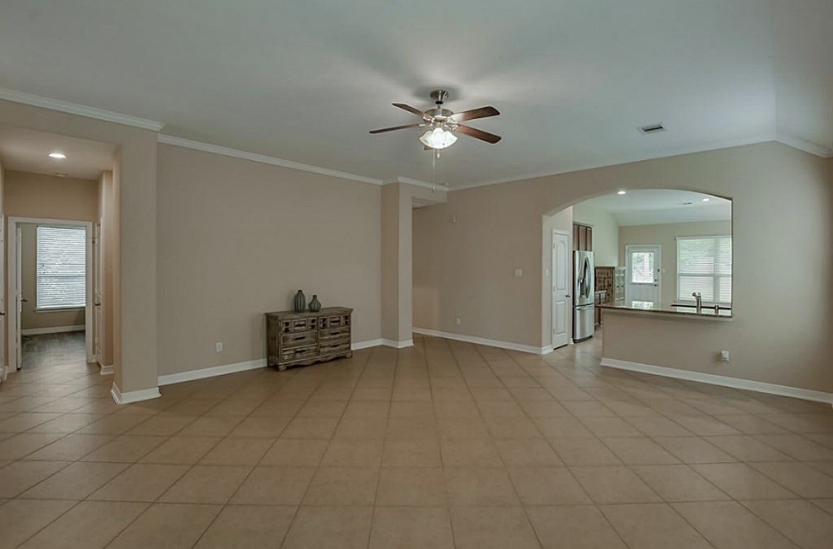 16710 Dover Mills Drive Spring, TX 77379 - Photo 5 of 15 a view of an empty room with a bathroom