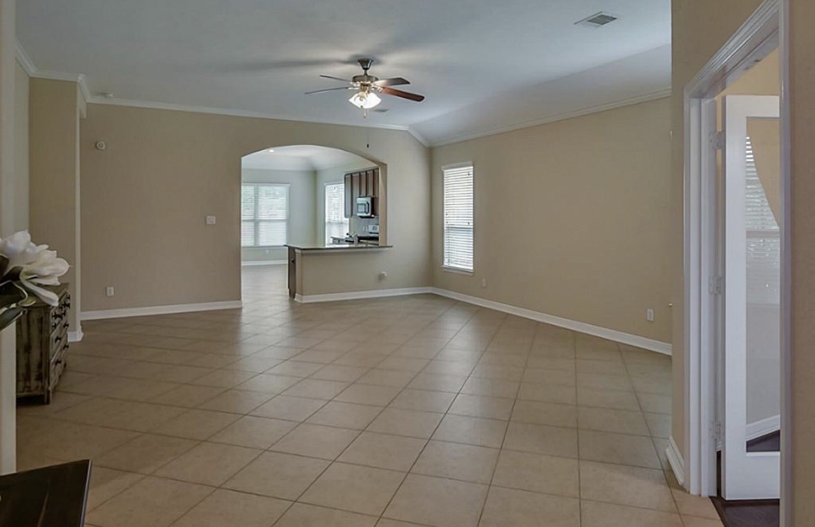 16710 Dover Mills Drive Spring, TX 77379 - Photo 9 of 15 wooden floor in an empty room with a window